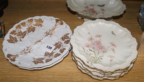 A Limoges dessert service and two Meissen gilt decorated plates